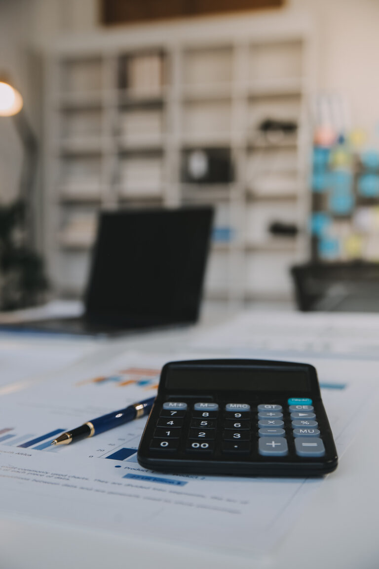 Business owner reviewing finances asking do I need a CFO for cash flow problems